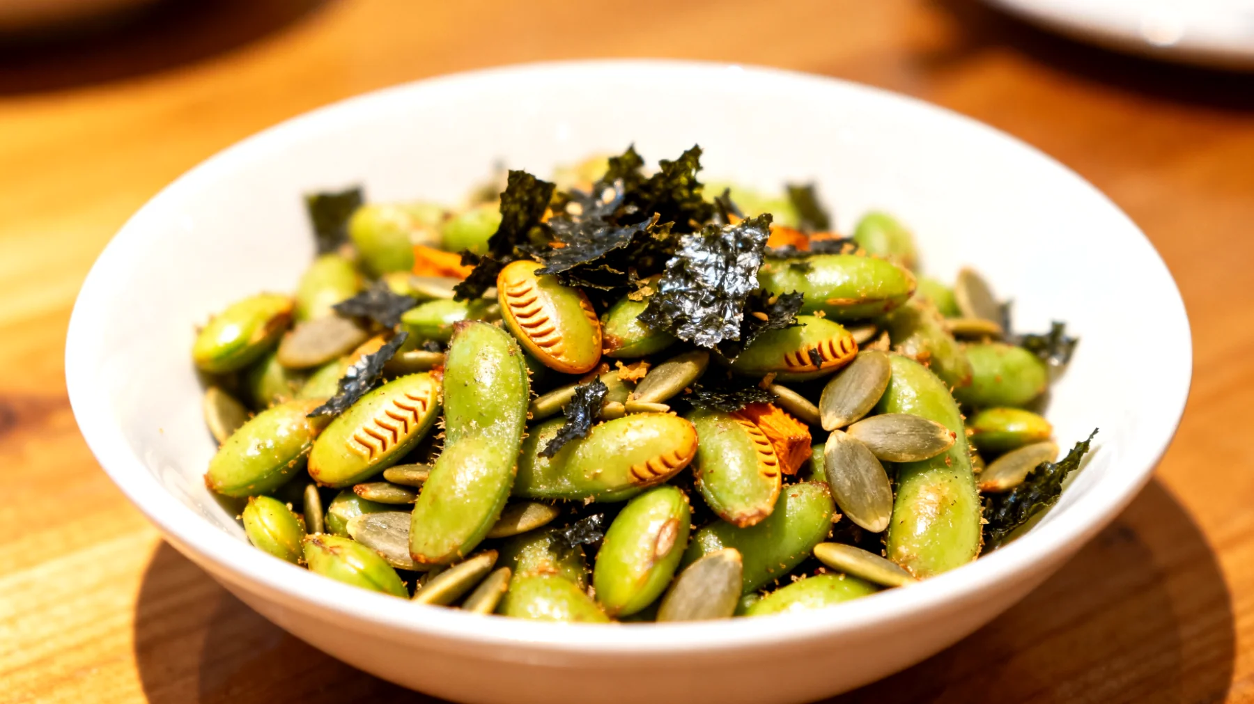 Edamame tostati con semi di zucca e alga nori sbriciolata"